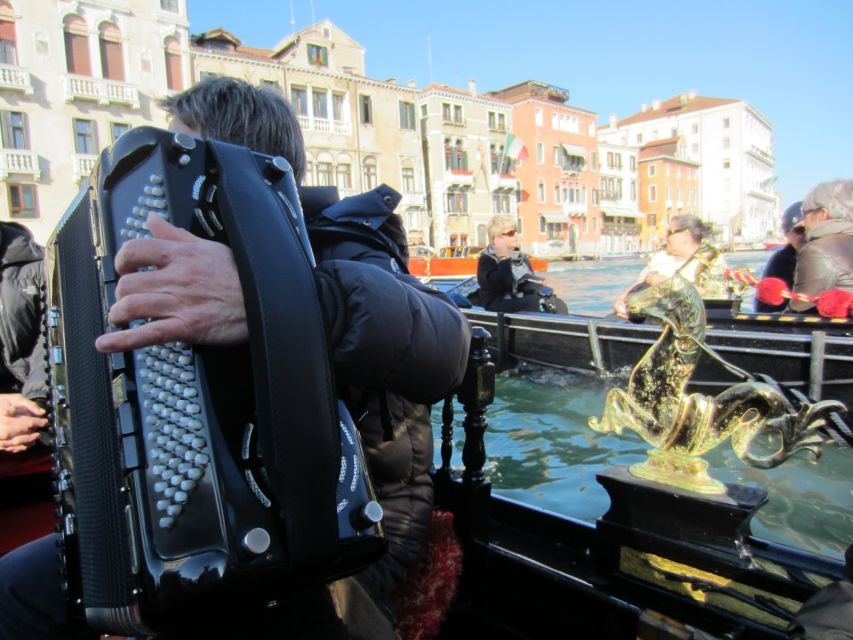 Venice: 30-Minute Gondola Ride on Grand Canal with Serenade - La Fenice, San Moisè, and the narrow canals