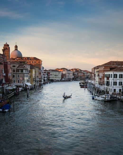 Venice: St. Mark’s Walking Tour & Gondola Traghetto Crossing - The waterfront, prisons, and the Grand Canal crossing